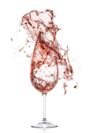 rose wine splashing on white backgroundの写真素材
