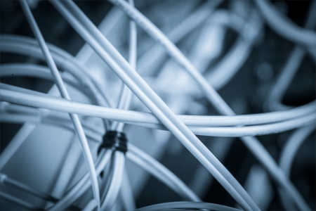 server with fiber optic  cables in data centerの写真素材