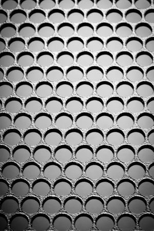 abstract metal grid backgroundの写真素材