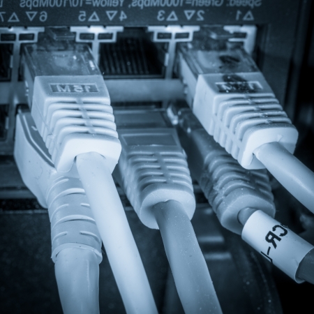 close-up of network hub and ethernet cables