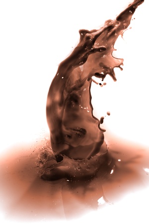 pouring chocolate drink, isolated on white backgroundの写真素材