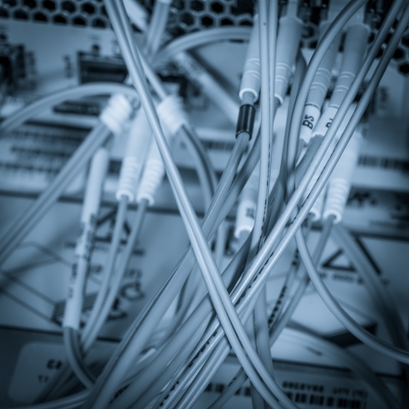 server with fiber optic  cables in data center
