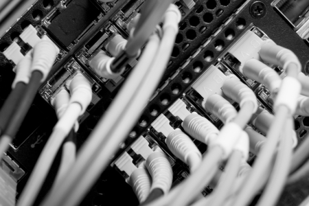 optic fiber cables connected to data centerの写真素材