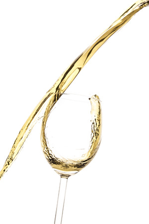 white wine splash isolated on whiteの写真素材
