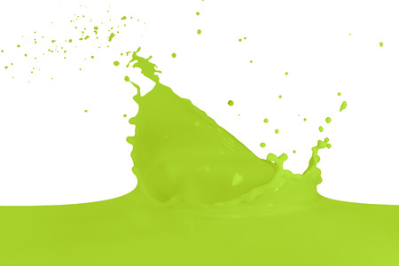 green paint splashing on whiteの写真素材