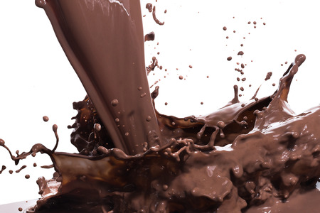 splashing hot chocolate, isolated on white backgroundの写真素材