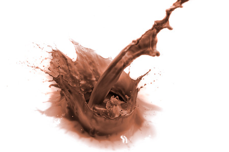 pouring chocolate drink, isolated on whiteの写真素材