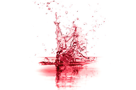 red wine splash isolated on whiteの写真素材