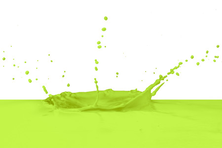 green paint splashing on white