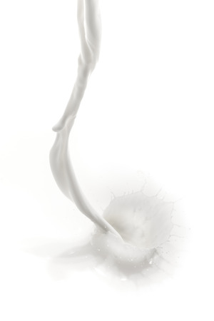 splashing milk on white backgroundの写真素材