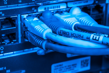 close-up of network hub and ethernet cables