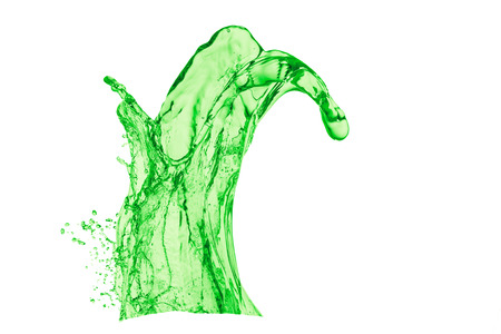 green juice splash on white backgroundの写真素材