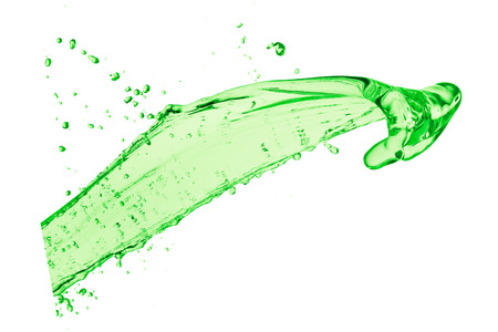 green juice splash on white backgroundの写真素材