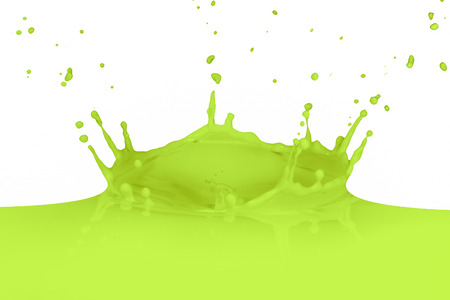 green paint splashing on whiteの写真素材