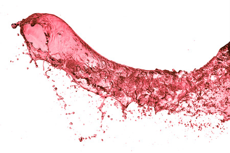 red wine splash, isolated on white backgroundの写真素材