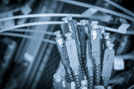 server with fiber optic  cables in data center