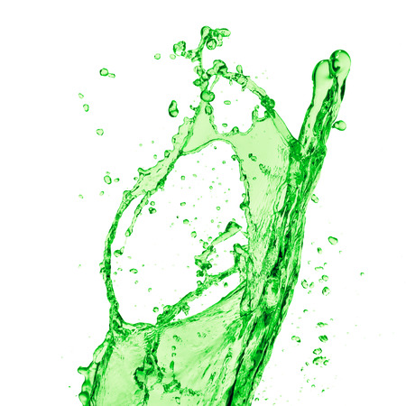 green juice splash on white backgroundの写真素材