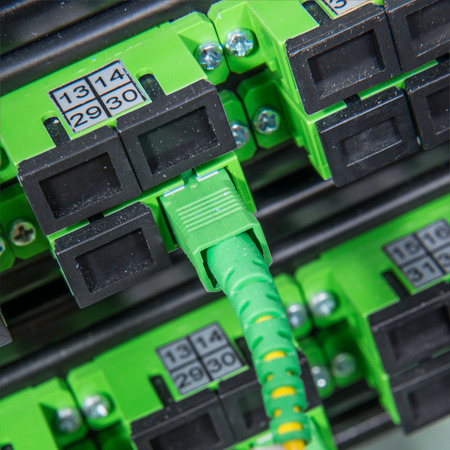 server with fiber optic  cables in data center
