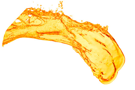orange juice splash on white backgroundの写真素材