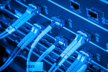 server with fiber optic  cables in data center