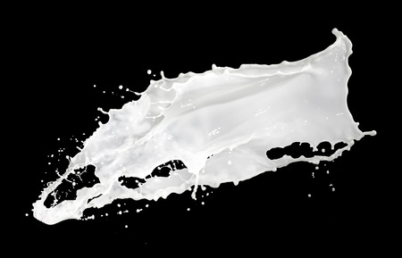 milk splash isolated on black backgroundの写真素材