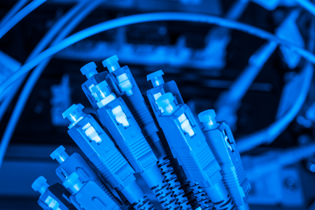 server with fiber optic  cables in data center