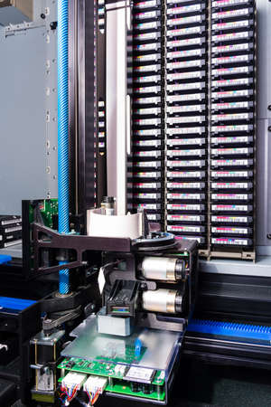 tall stacks of data backup tapes in internet cloud center