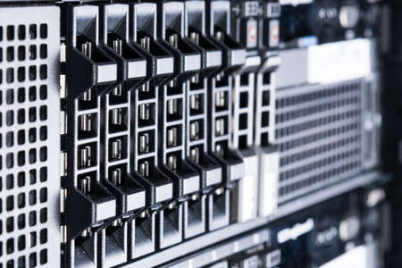 Row of hard drives serving as data storage inside server room