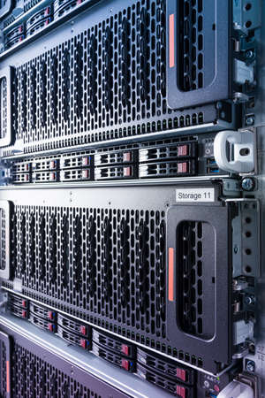 Row of hard drives serving as data storage inside server room