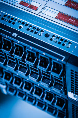 Row of hard disks used for data storage in internet data centerの写真素材