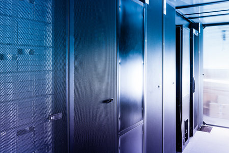 data center with row of data storage cabinetsの写真素材