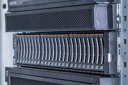 Row of hard drives serving as data storage inside server room