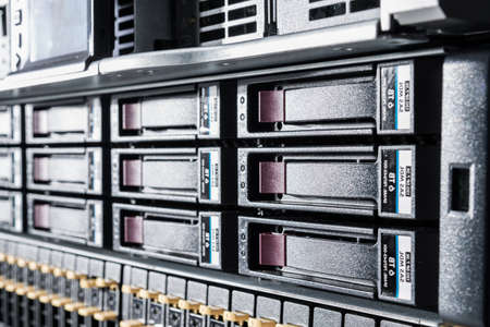 Row of hard drives serving as data storage inside server room