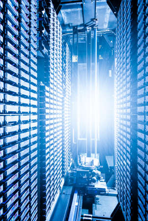 rows of data cloud hardware inside data center