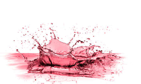 red wine splash isolated on whiteの写真素材