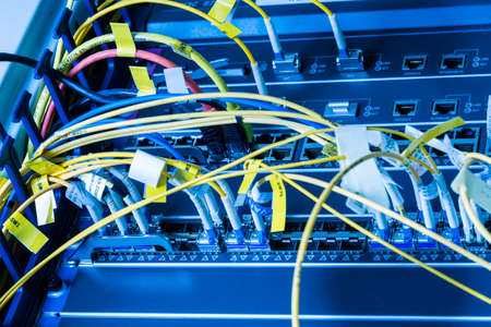 server inside data center with cables connected to data switch