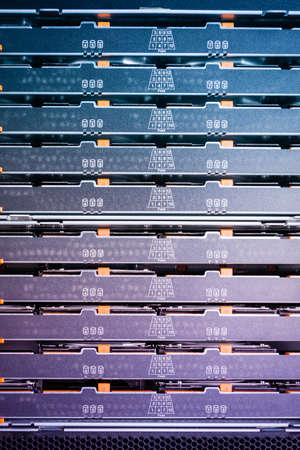 close-up of a server with trays filled with hard disks inside internet cloud centerの写真素材