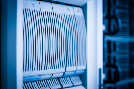 Row of hard disks used for data storage in internet data center