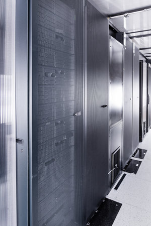 data center with row of data storage cabinets