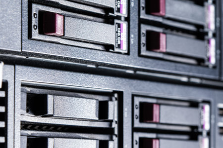Row of hard drives serving as data storage inside server room