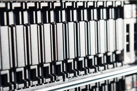 Row of hard disks used for data storage in internet data center