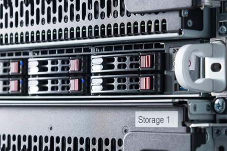 Row of hard drives serving as data storage inside server room