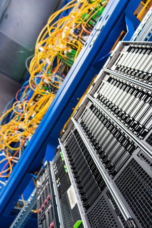 Row of hard disks used for data storage in internet data centerの写真素材