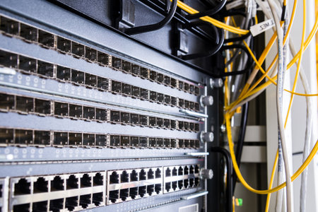 close-up of switch panel with empty ethernet and fiber optics portsの写真素材