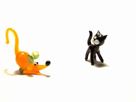glass mouse and cat figures on the white backgroundの写真素材