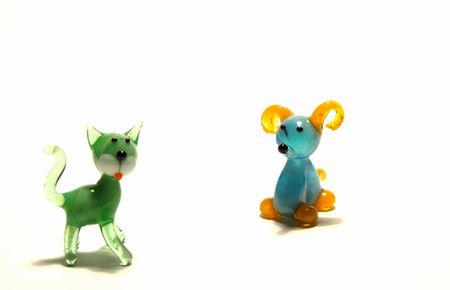 glass mouse and cat figures on the white backgroundの写真素材