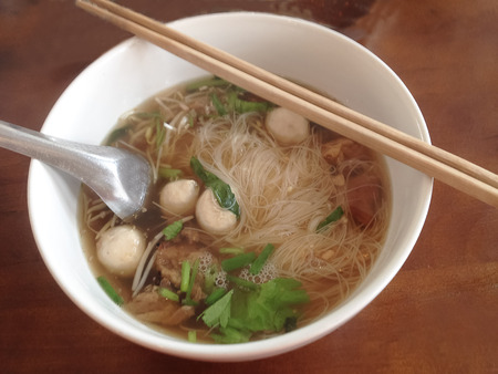 Pork noodle mix pork bone soup ,a delicious and popular food of Thailand.