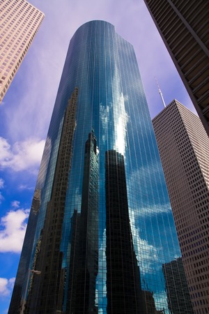 Wells Fargo Plaza, skyscraper in Houston, Texas, surrounded by other office buildingsの写真素材
