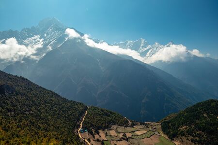 High peaks Kyashar and Kusum Kanguru in Nepal Himalayas seen from near Namche Bazaarの写真素材