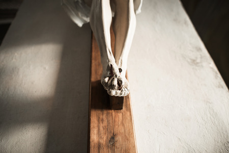 Stone Statue of the Crucifixion of Jesus Christ Close Up.の写真素材